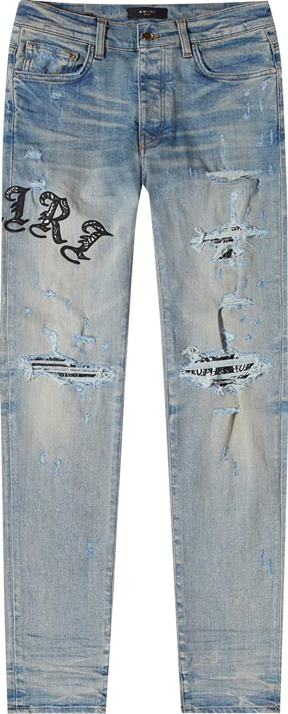 Amiri "Skinny Old English Logo" Jean 'Clay Indigo